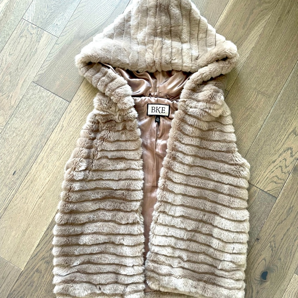 Beautiful faux fur vest with hood